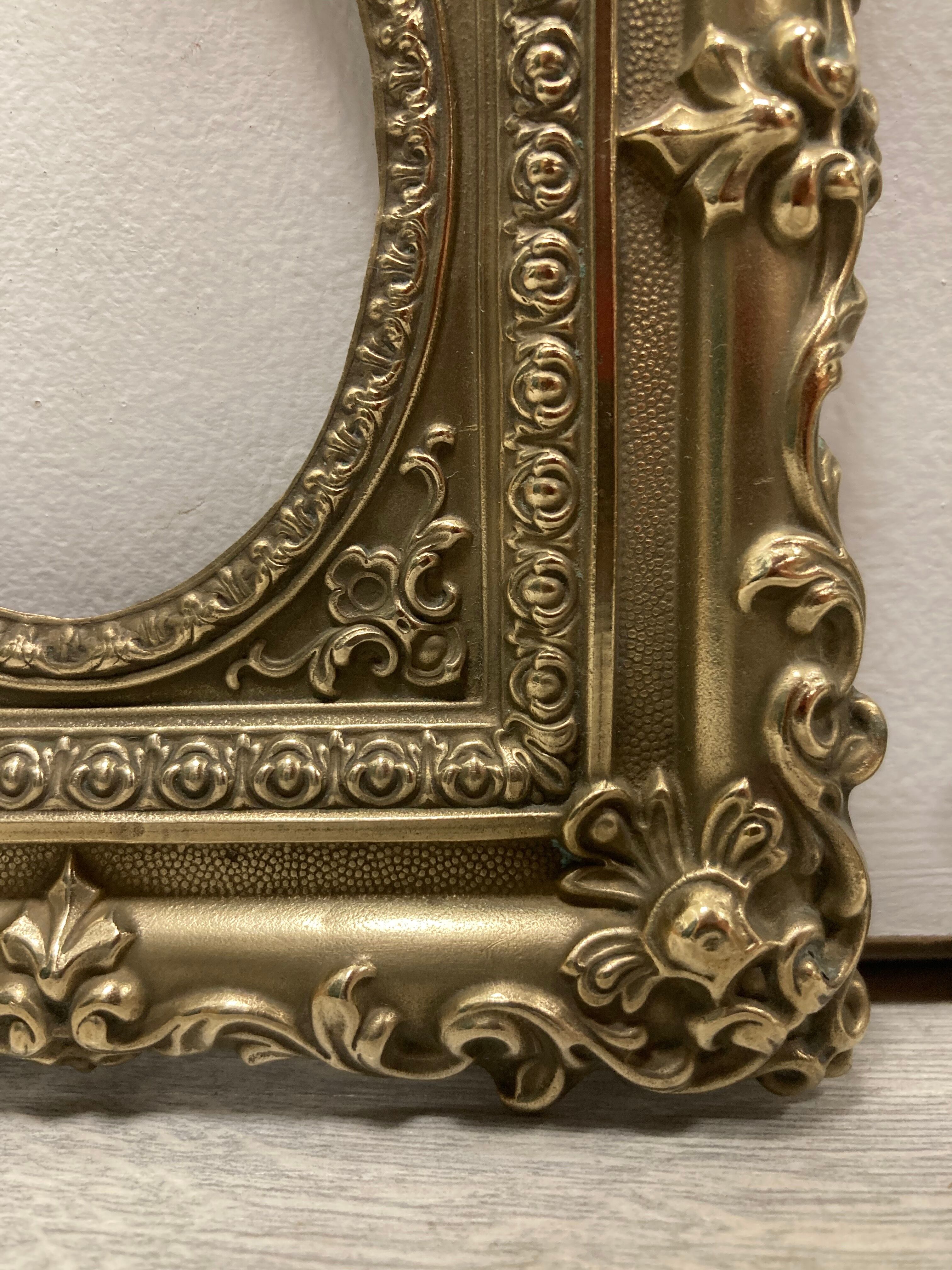 Pair of brass photo frames