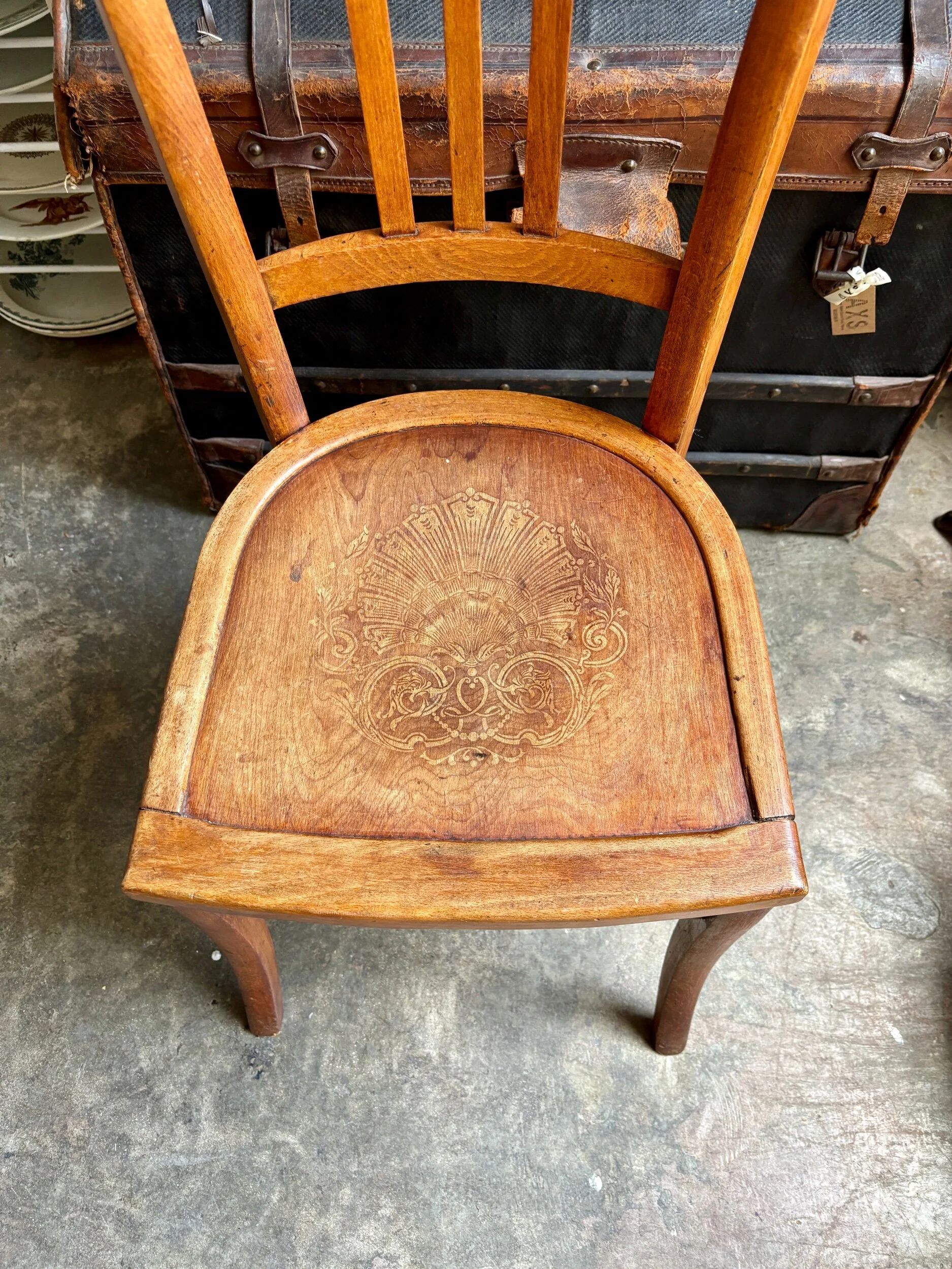 Luterma bistro chair in embossed beech, "shell" pattern.