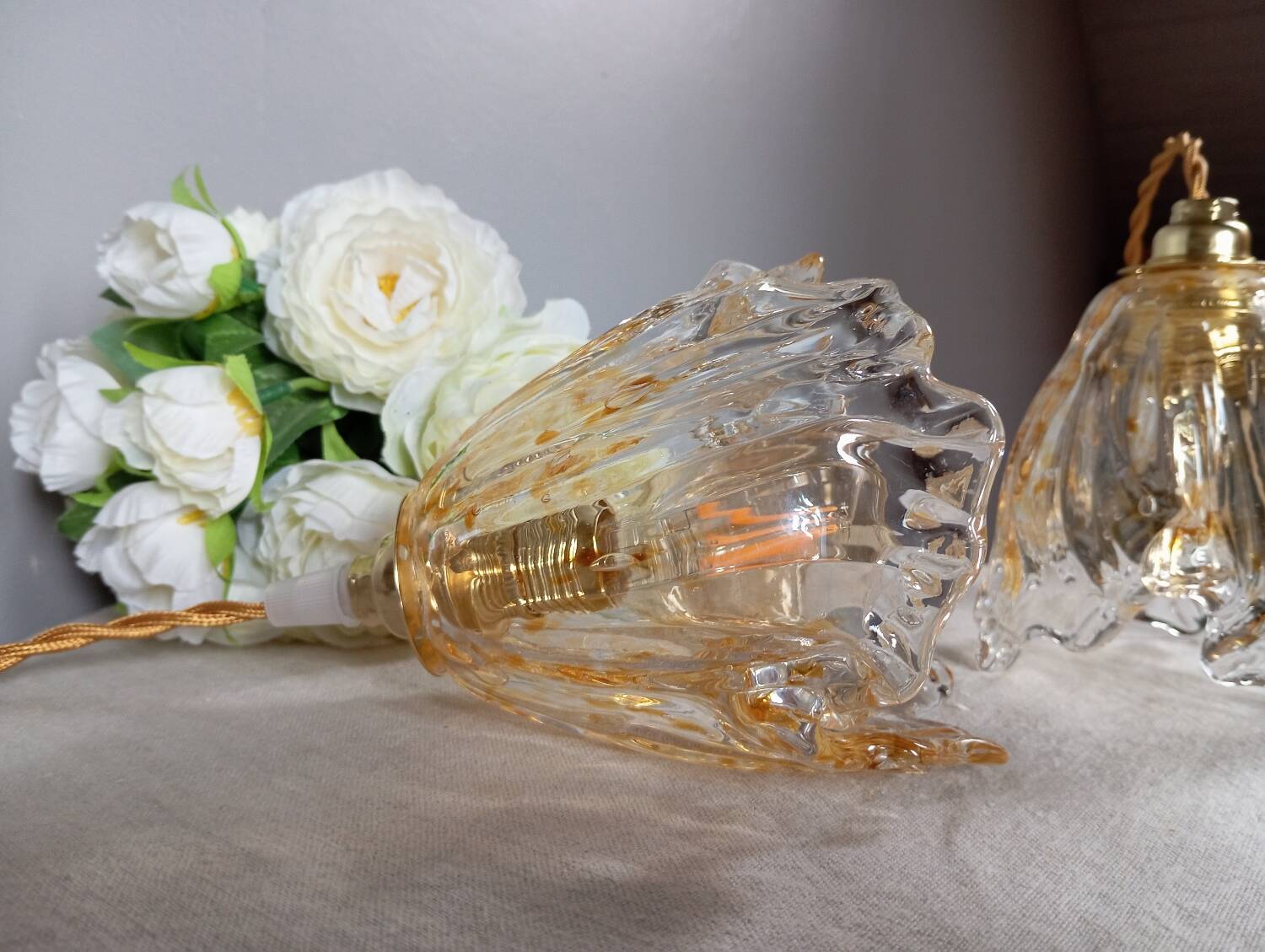 Pair of draped blown glass hanging lamps, ocher twisted wire