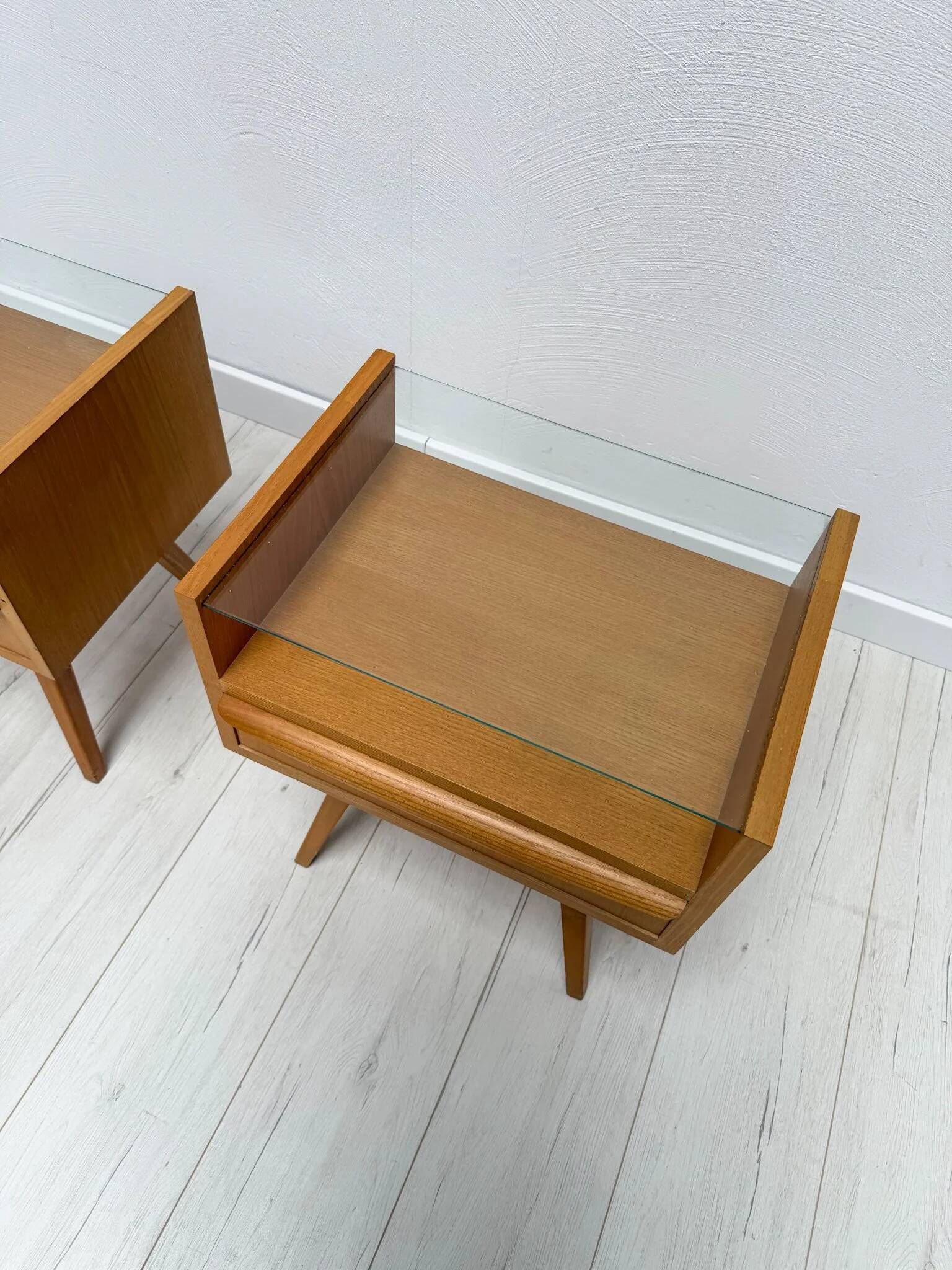 1960s vintage pair of mid-century walnut nightstands with glass shelves