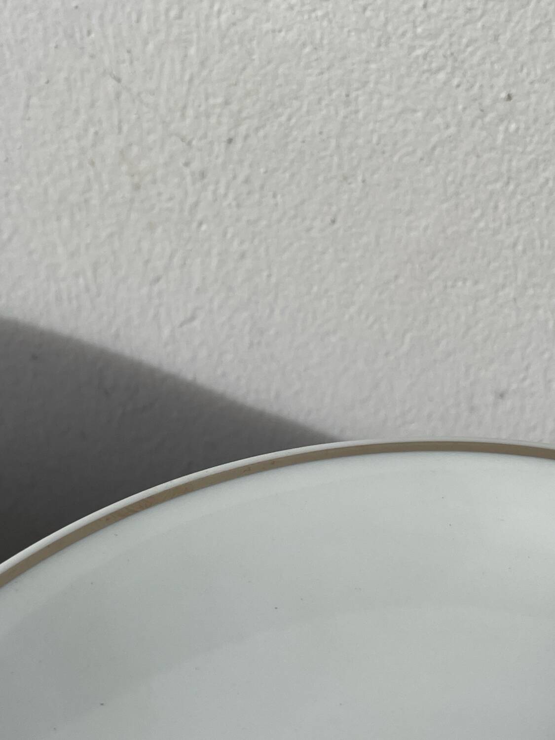 10 assiettes à dessert en porcelaine de Limoges blanches