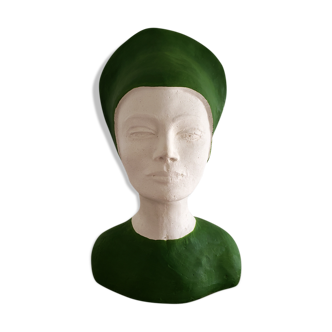 Bust of a woman in green and white plaster