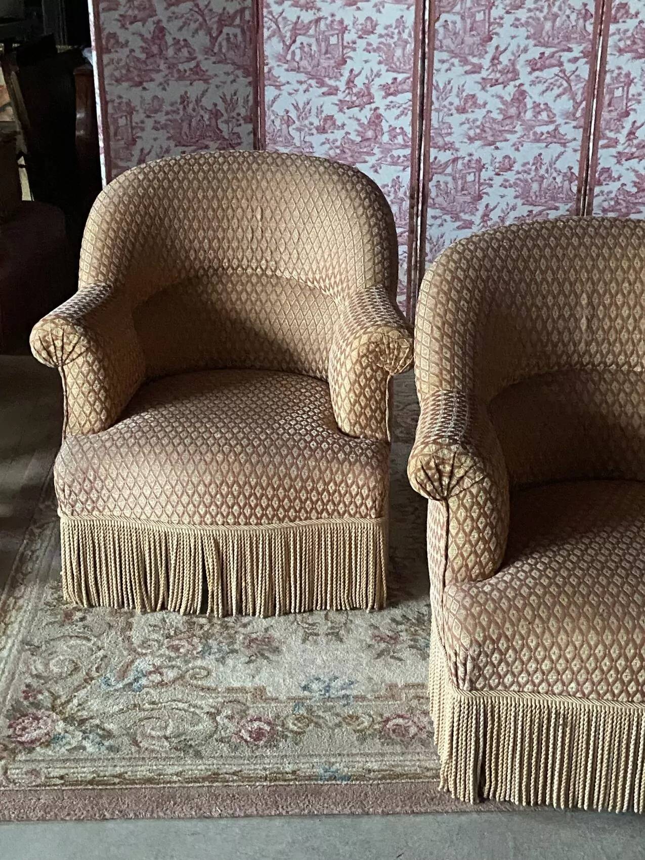 Pair of renovated upholstered frog chairs in beige velvet.