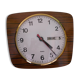 Formica wall clock with day and date - 1970s