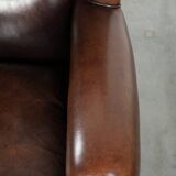 Sheepskin wingback armchair with beautiful deep and warm colours