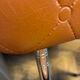 Armchair with armrests from the 70s in Skai and chrome.