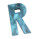 Ancient letter r sign metal painted