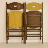 Pair of vintage folding chairs year 50 sculpted backrest.