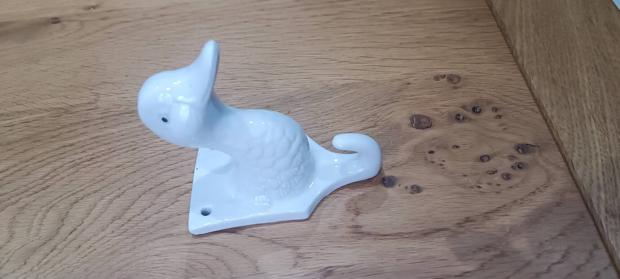 Wall-mounted duck head coat hook in white ceramic, cottagecore style.