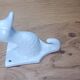Wall-mounted duck head coat hook in white ceramic, cottagecore style.