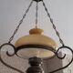 Wrought iron chandelier amber glass