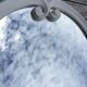 Oval mirror enamelled cast iron and its hook, circa 1950 39x49cm