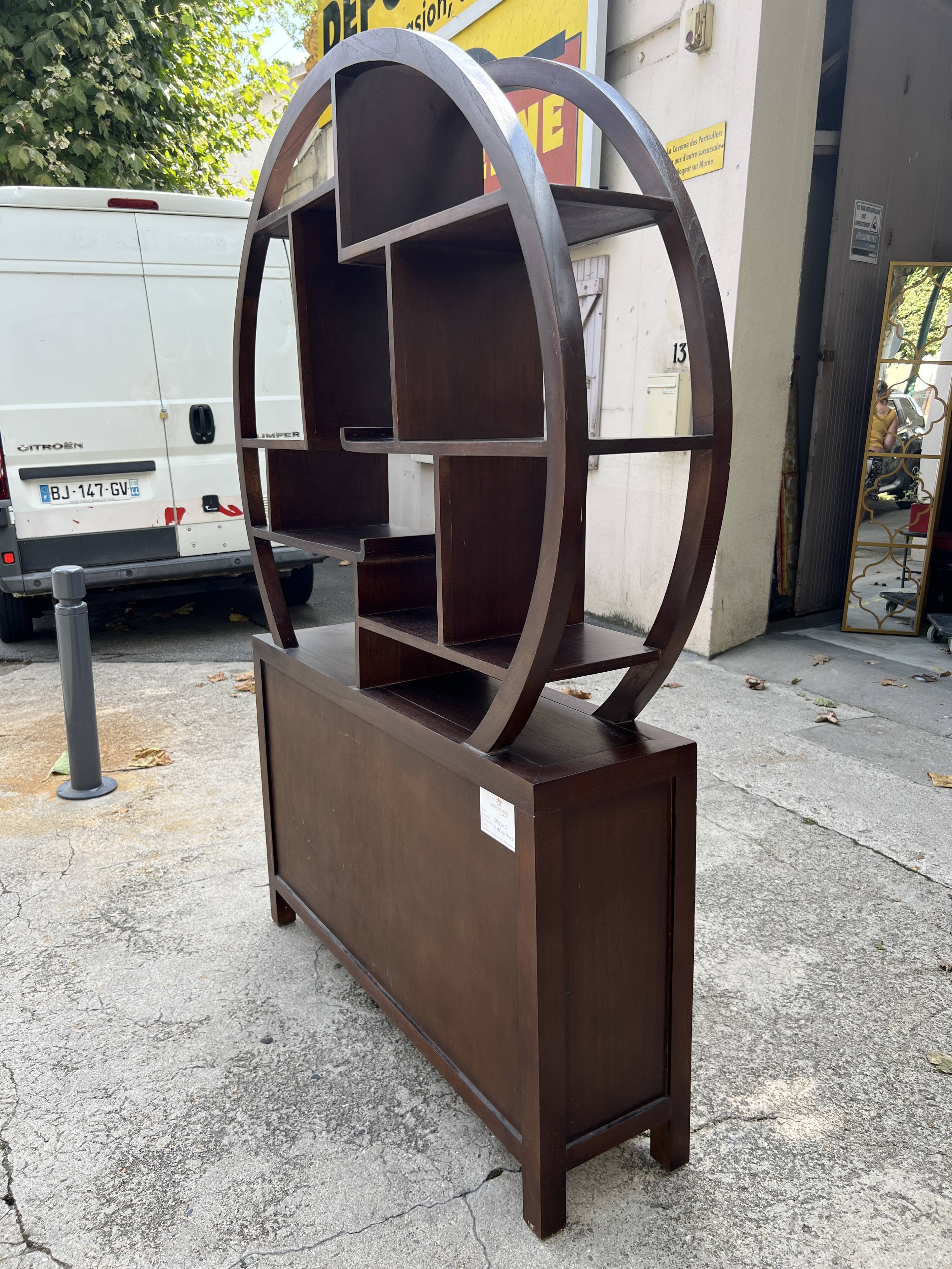 Round galay shelf on bahut sideboard