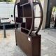 Round galay shelf on bahut sideboard