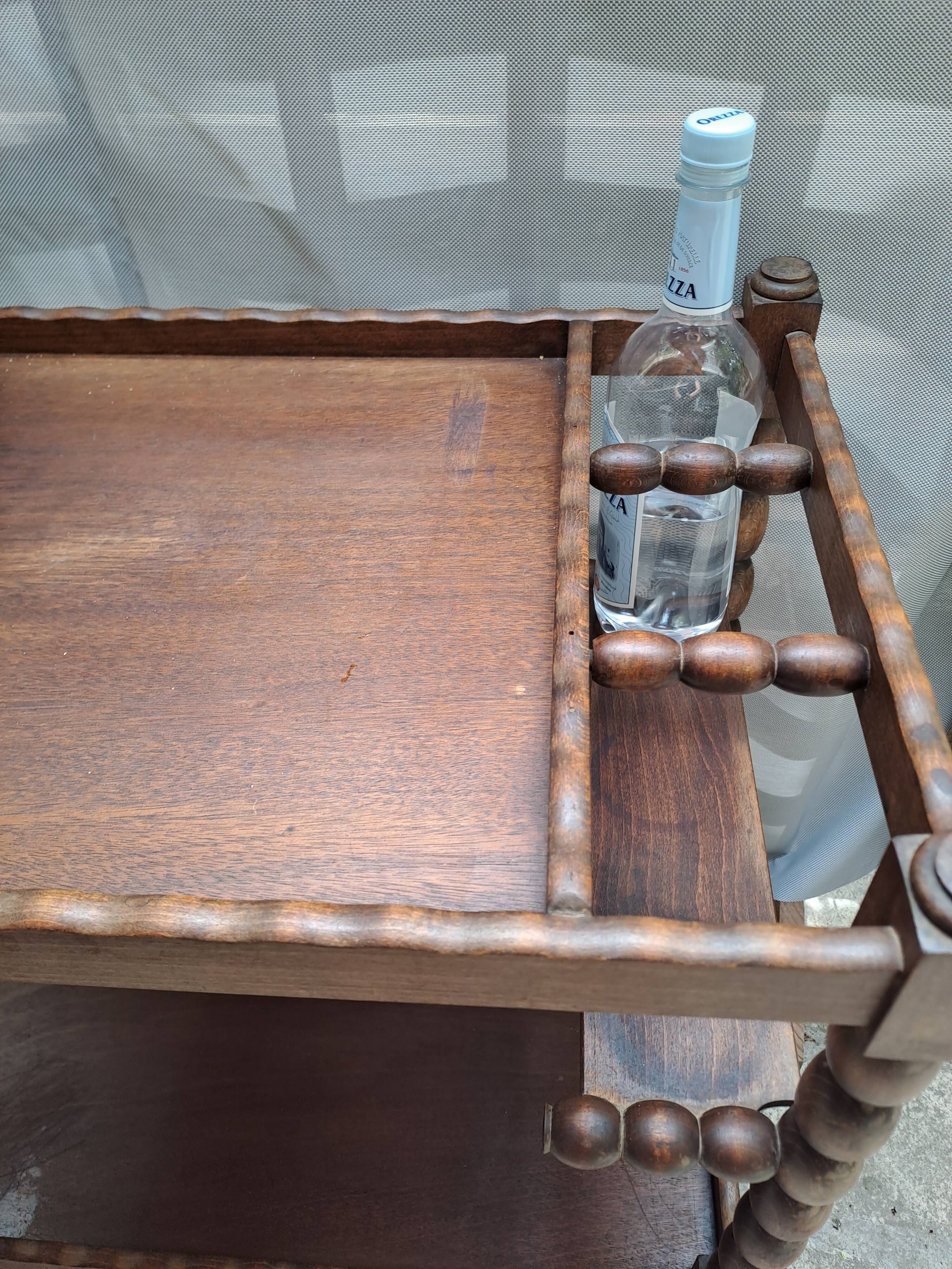 Dessert, table with wheels, side table in solid wood stained brown color France 1960