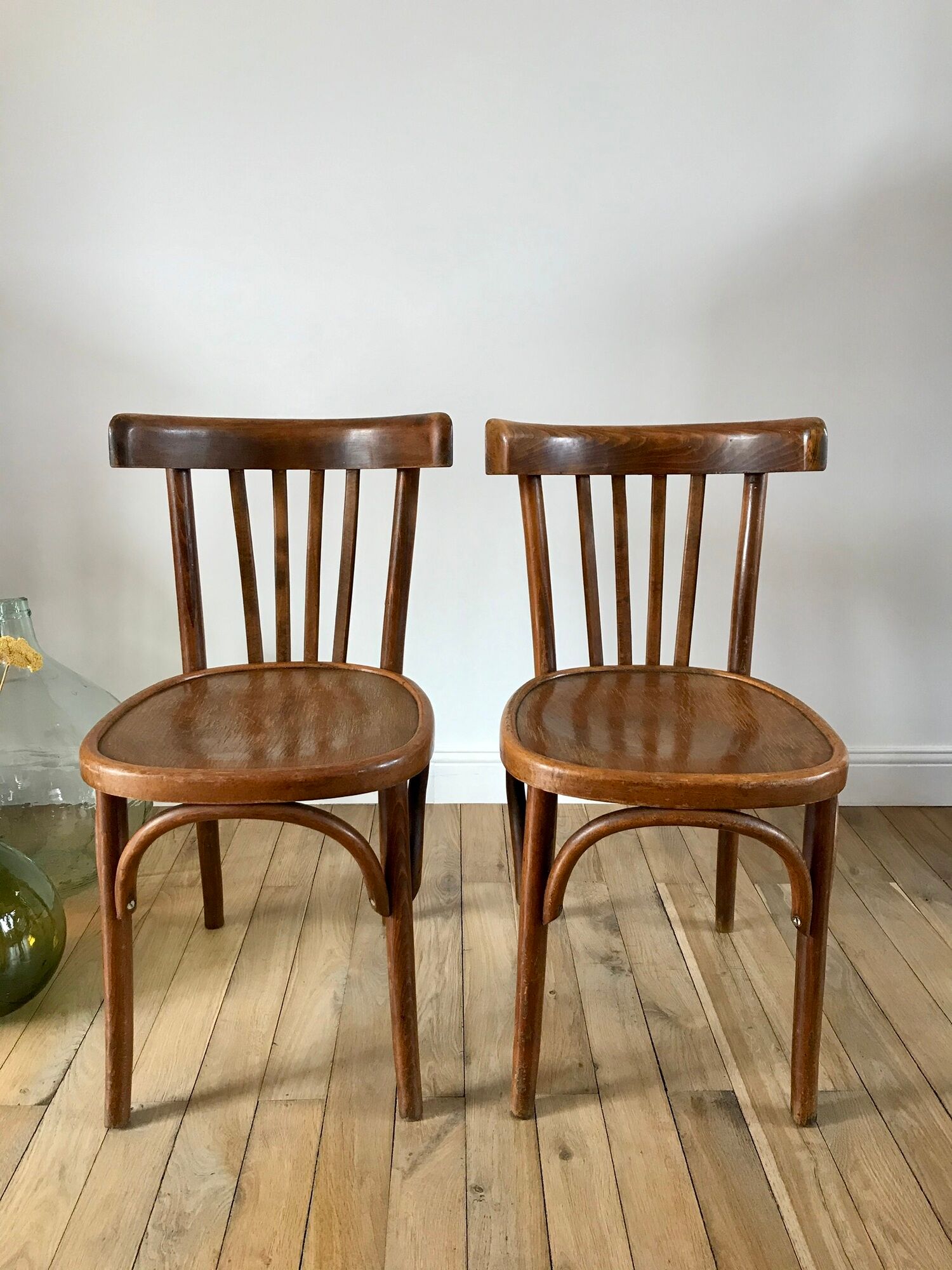 Pair of Baumann curved wood bistro chairs early twentieth century