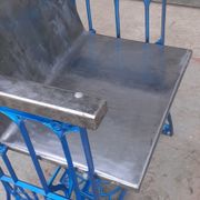 Electric blue metal armchair