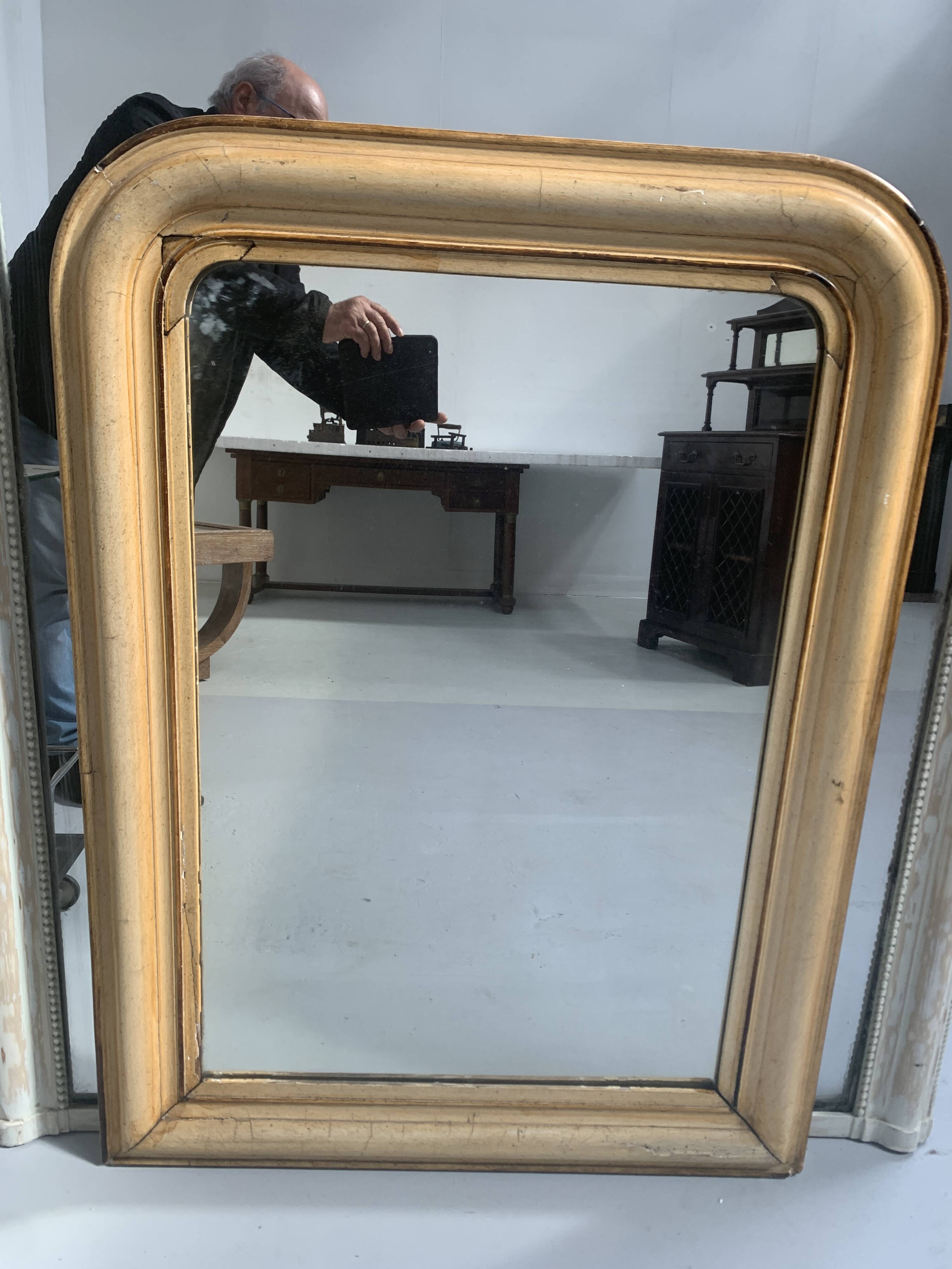 Louis Philippe mirror in wood and parinated stucco, 19th century