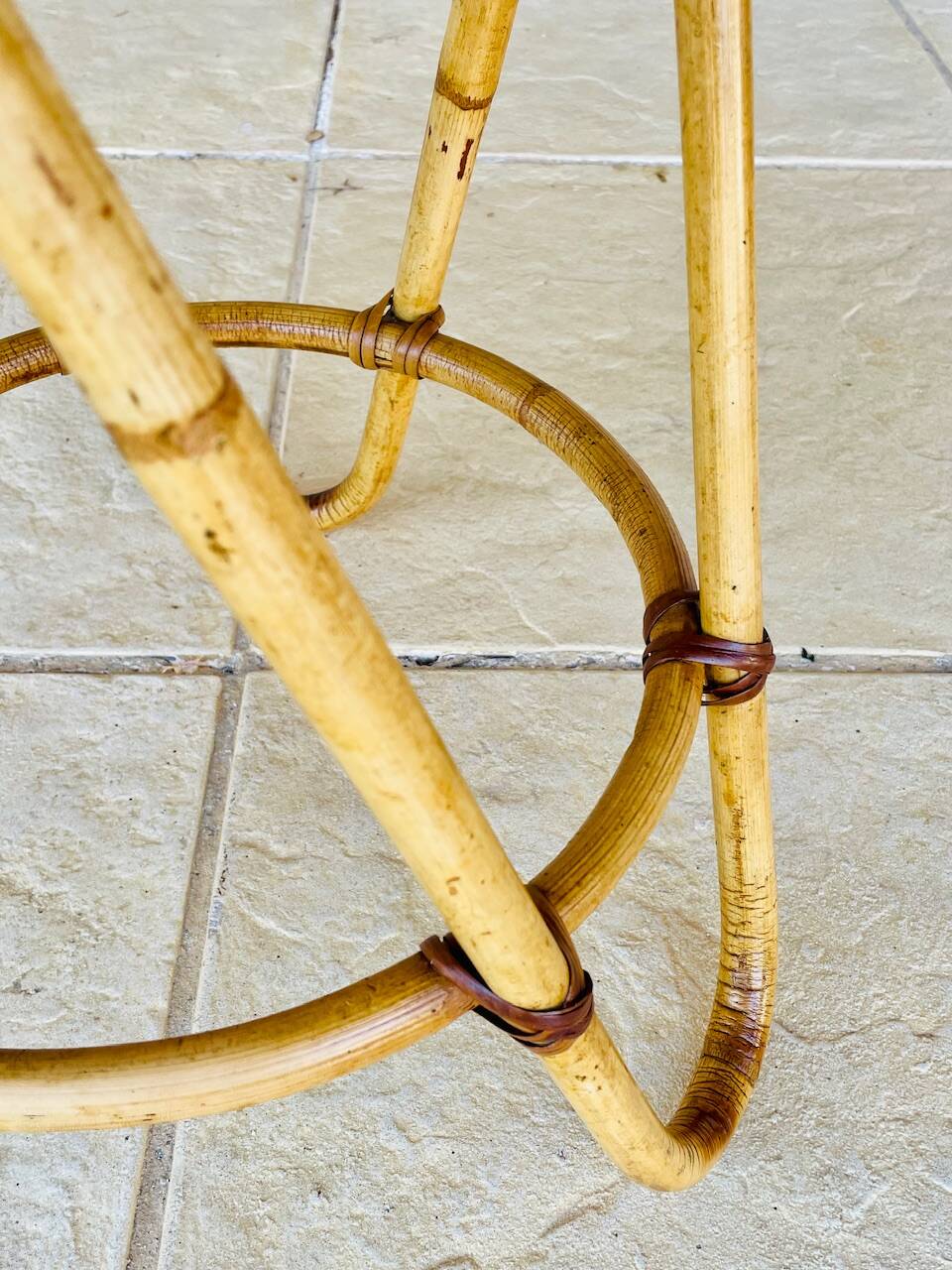 Vintage rattan and bamboo side table, circa 1969.