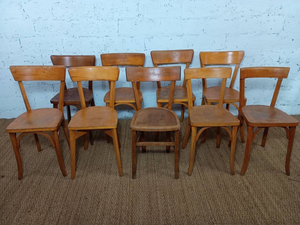Set of 9 mismatched bistro chairs, 1950s.