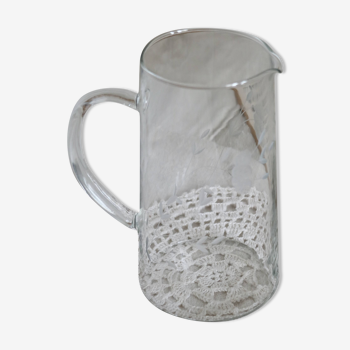Large vintage engraved glass pitcher with floral pattern