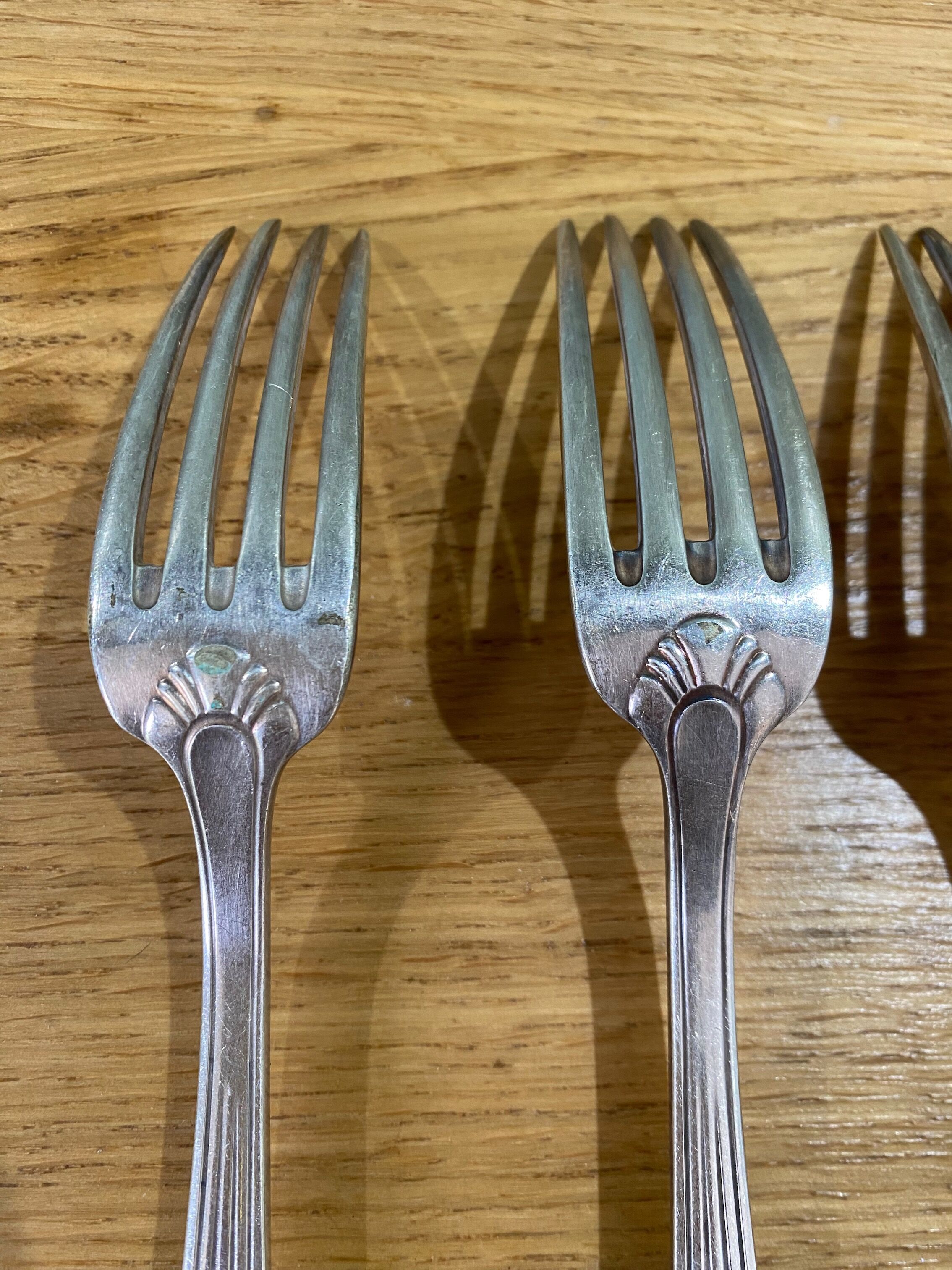 5 antique forks in silver metal