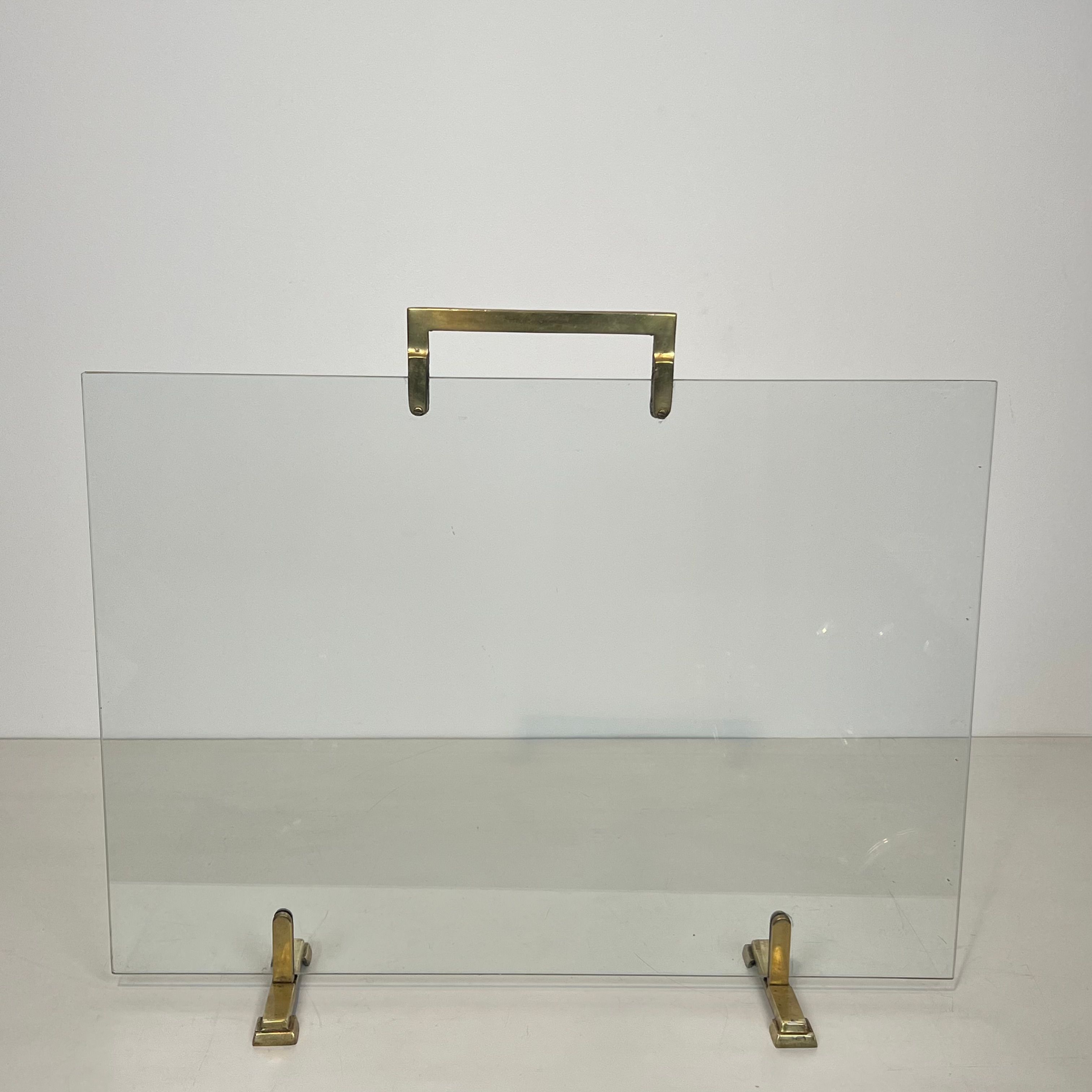 Glass and brass fire screen