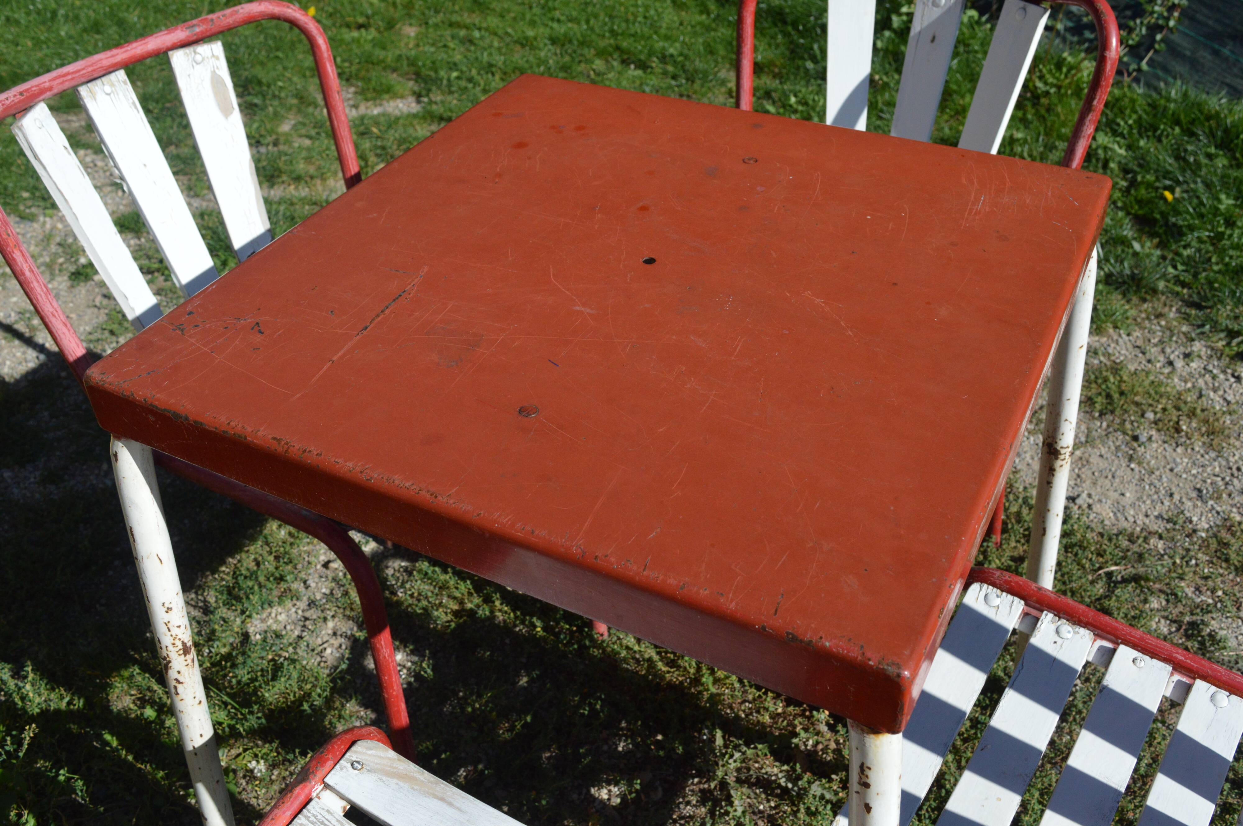 Table and four iron garden chairs from the 1950s