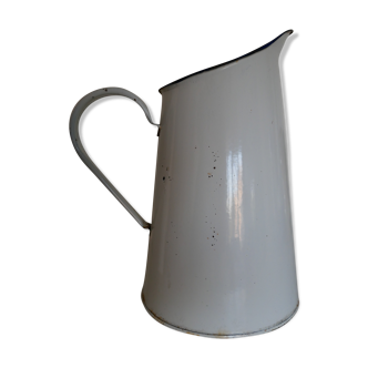 White enamelled metal broc