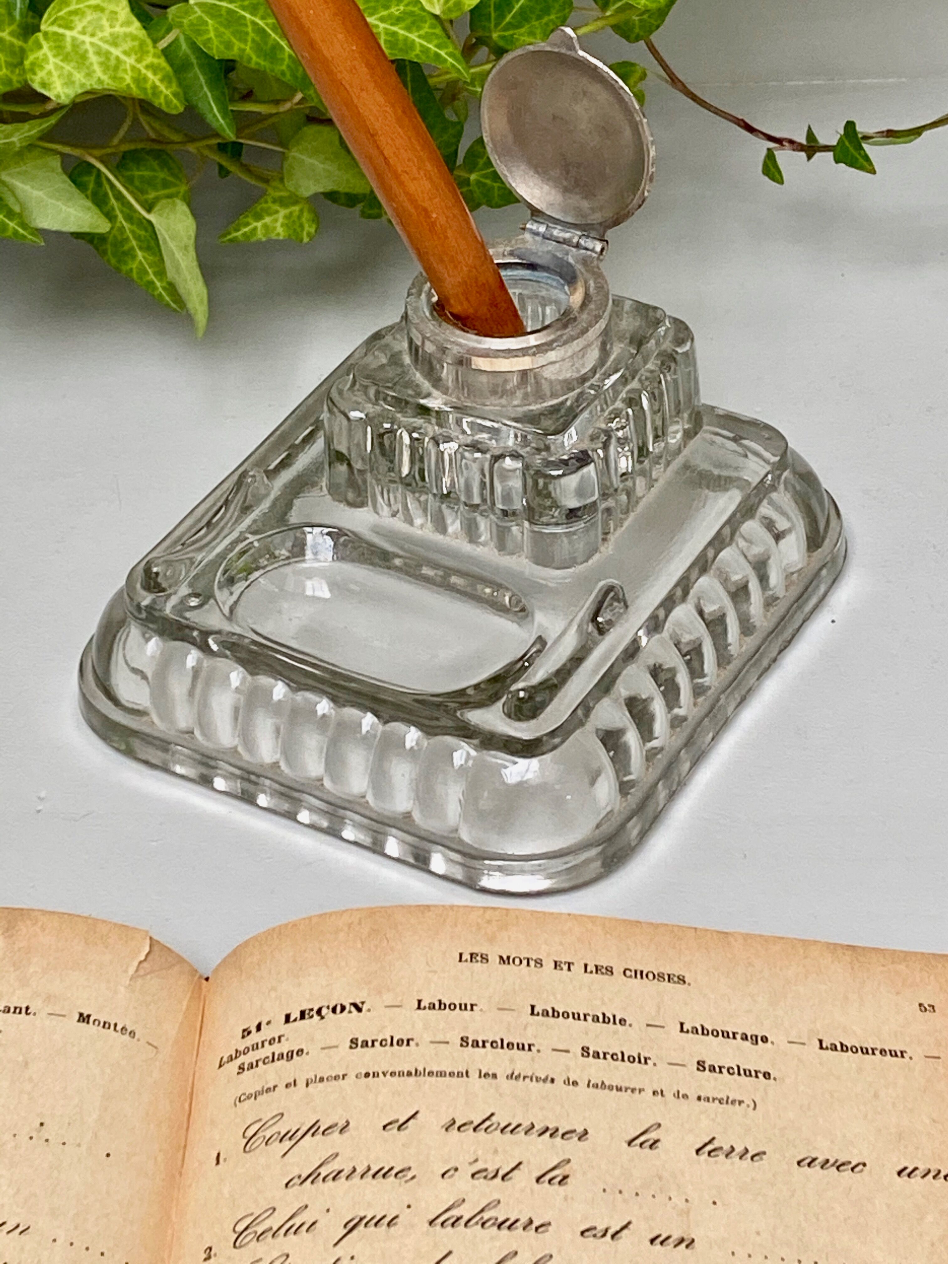 Old glass inkwell
