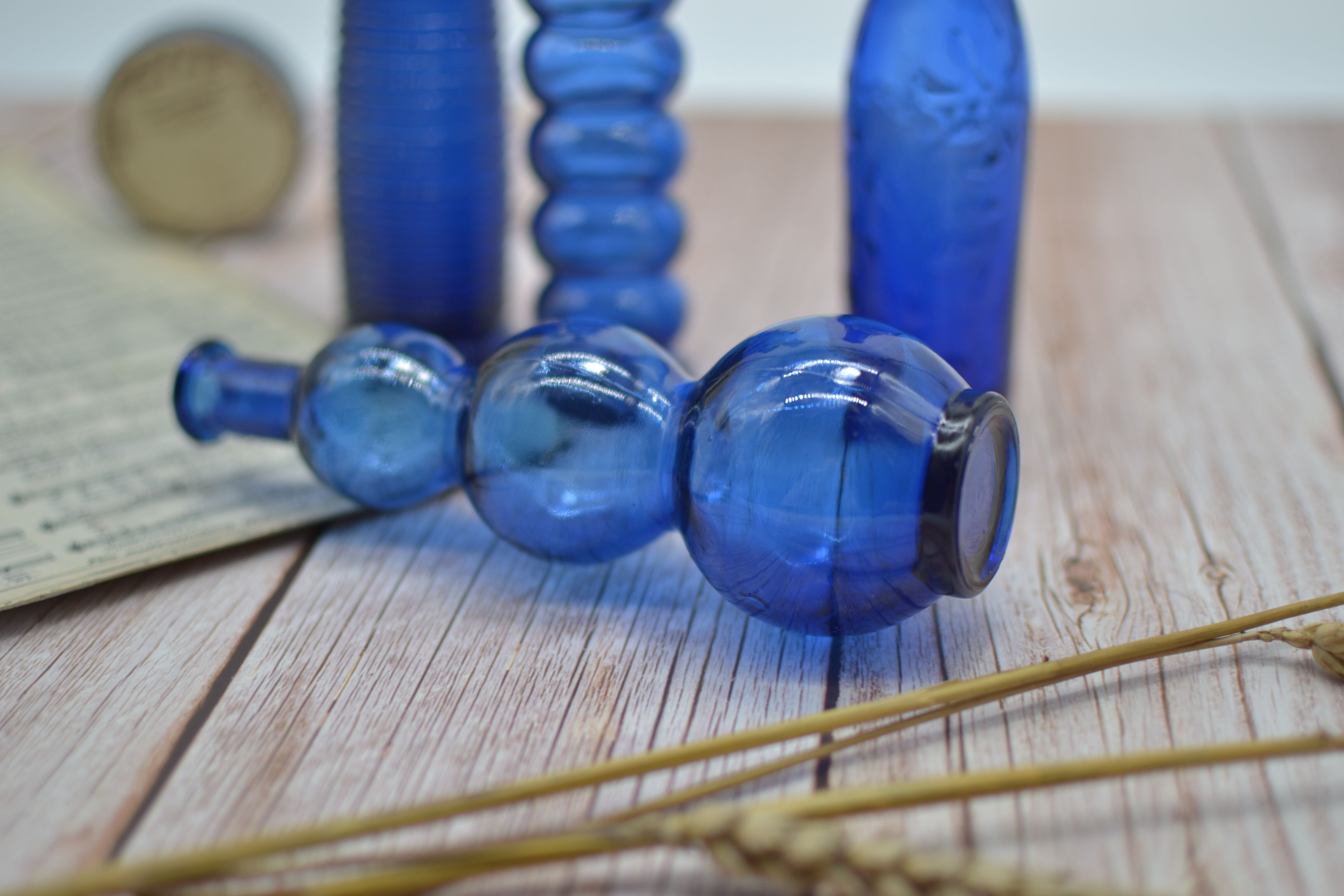 Lot de 4 bouteilles bleues de décoration