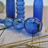 Set of 4 blue bottles of decoration