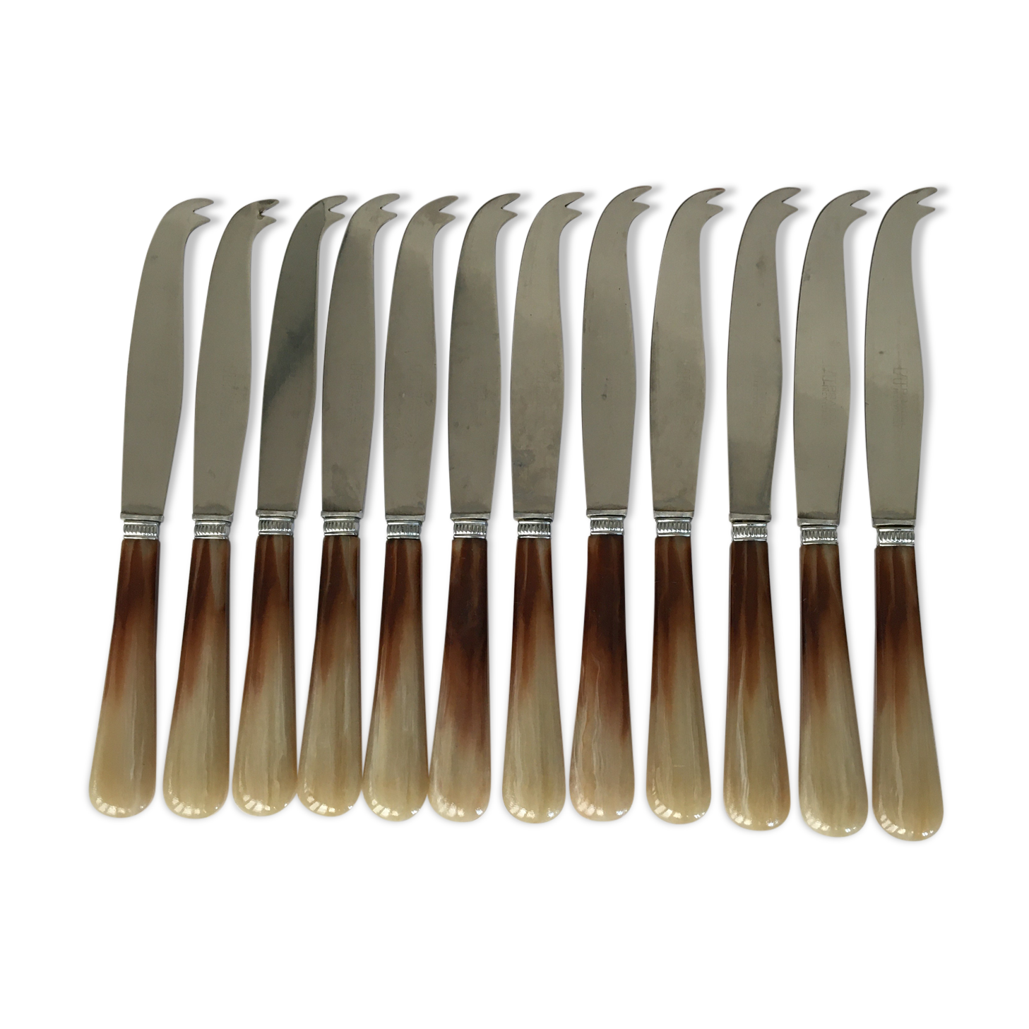 Set of 12 Pradel cheese knives