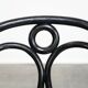 Set of 2 black vintage bistro chairs with an elegant design