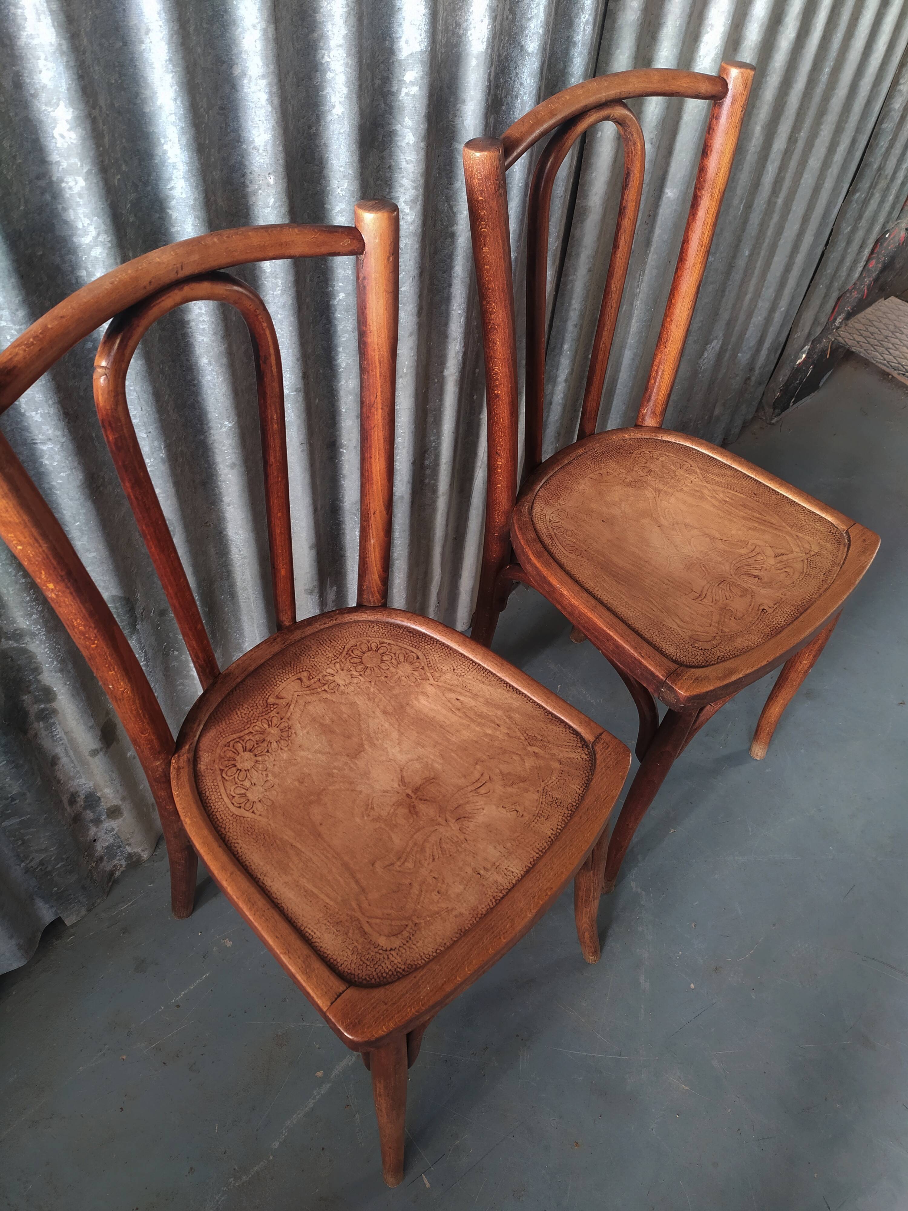 Pair of curved wooden bistro chairs