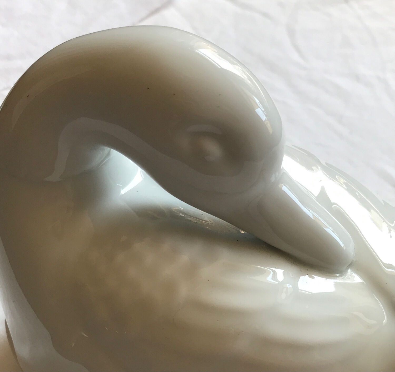 Porcelain duck dish with lid on fire