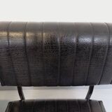 Set of 2 vintage modernist armchairs in black faux leather and metal.