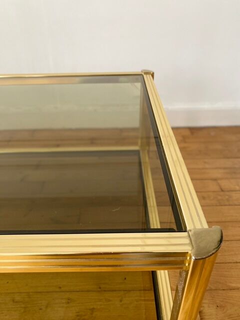 Gold metal coffee table and smoked glass