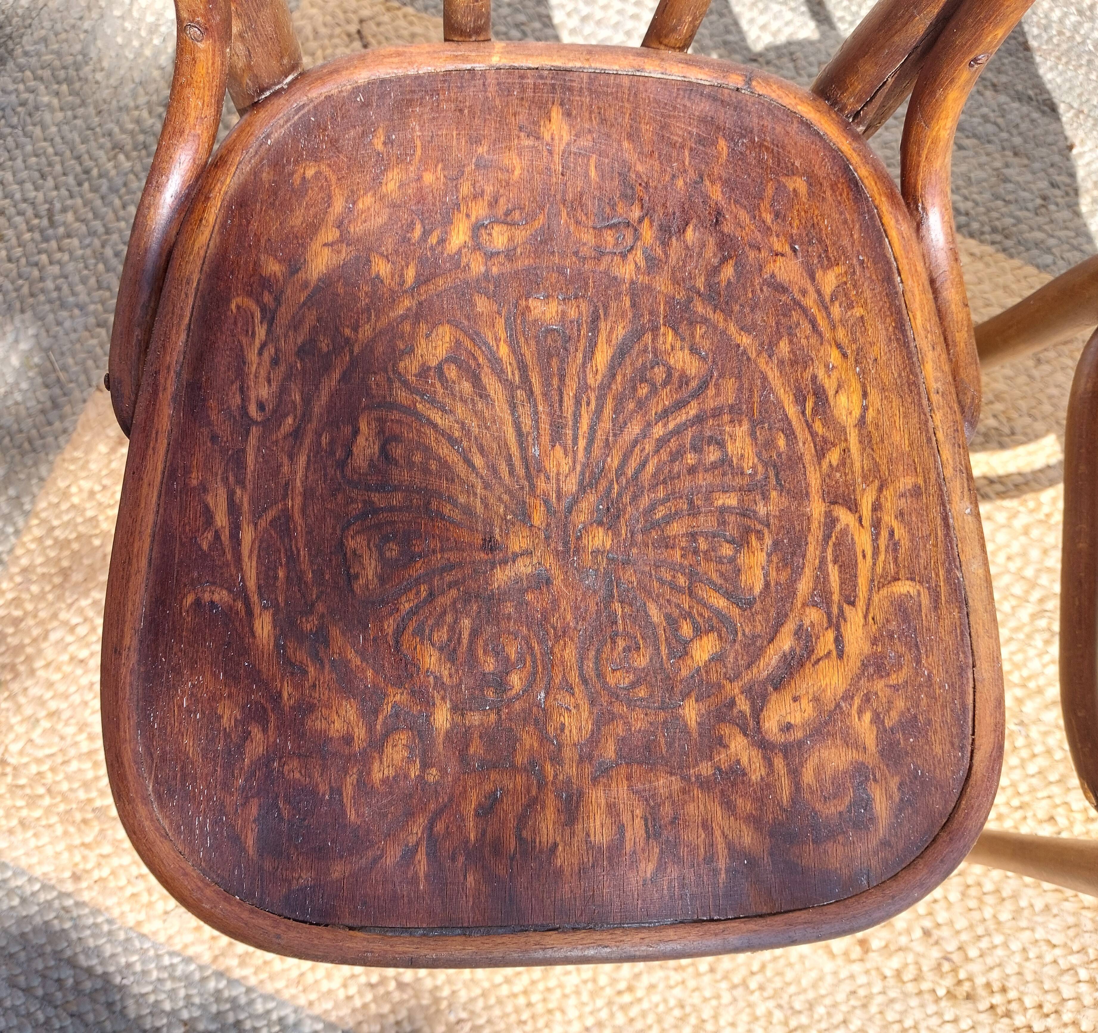 set of 3 curved wooden bistro chairs with patterns