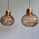 Pair of honeycomb smoked glass pendants, Glasshütte Limburg, 1970