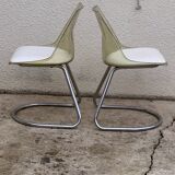 Pair of 70's smoked plexiglass and chrome chairs