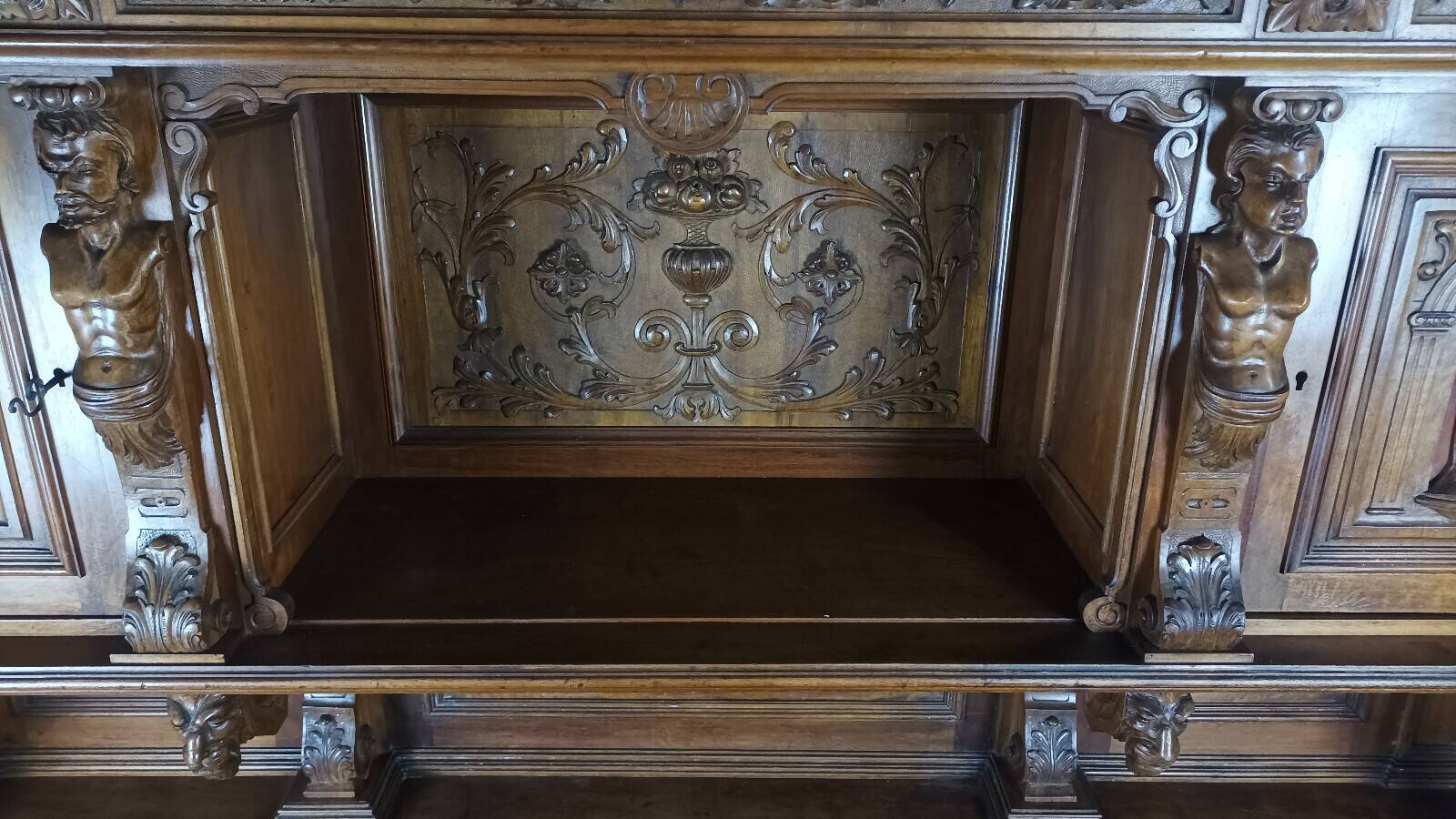 19th-century walnut buffet with two bodies.