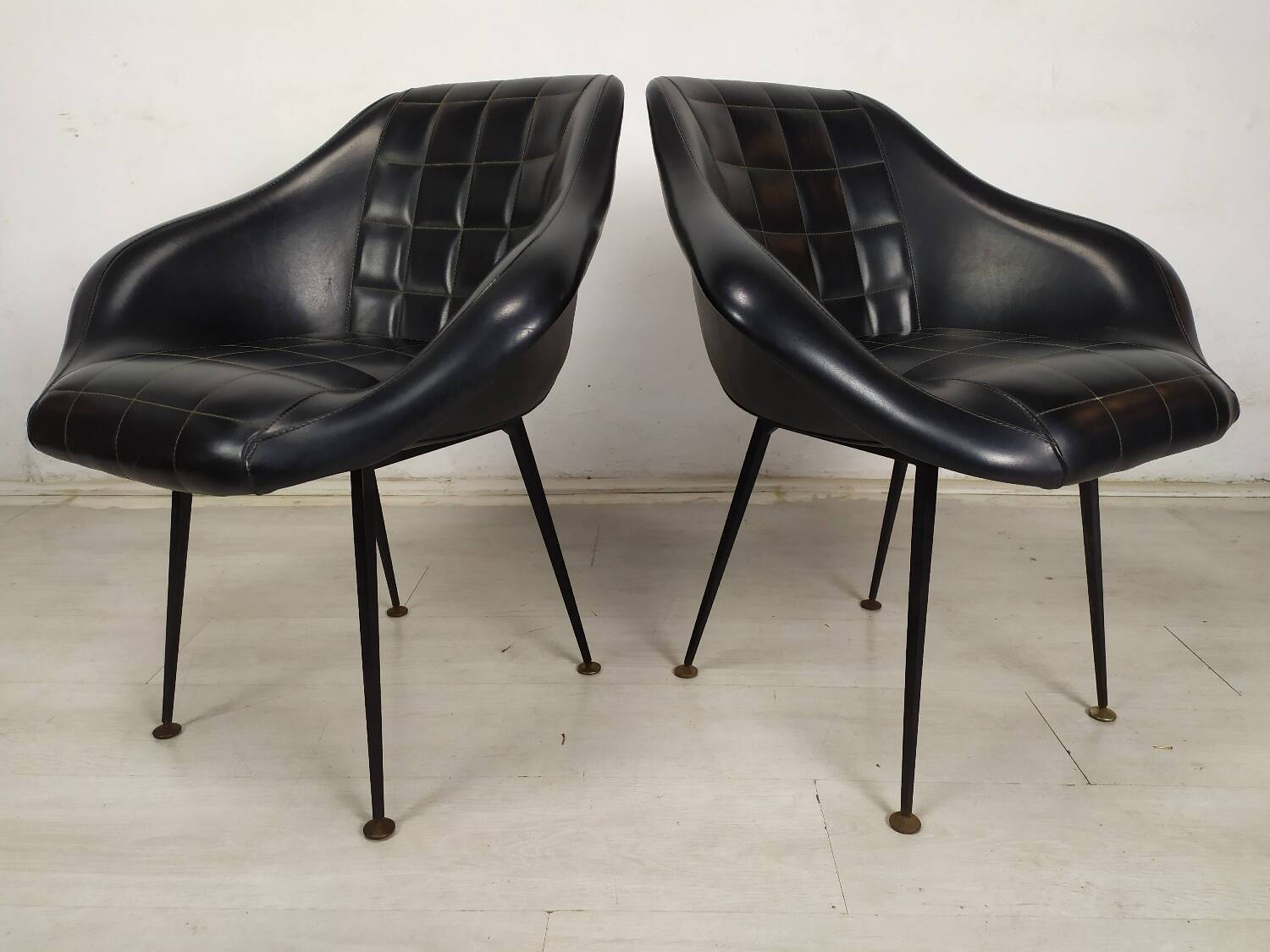 Vintage black skai armchairs