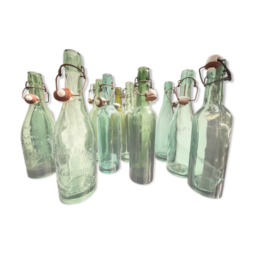 Lot de 12 bouteilles bières 1930