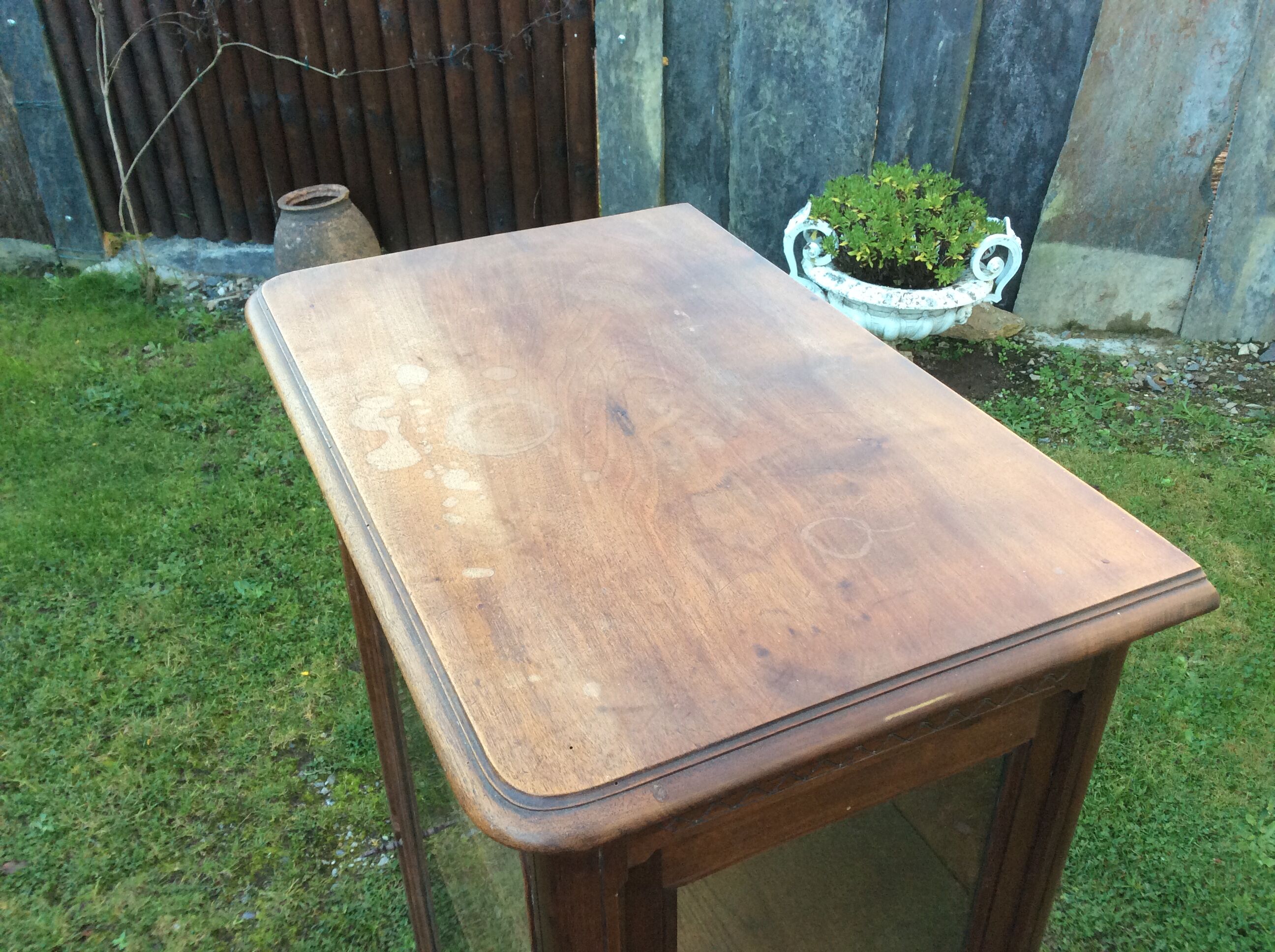 Louis XV Rocaille style showcase in solid walnut, beveled door glass.
