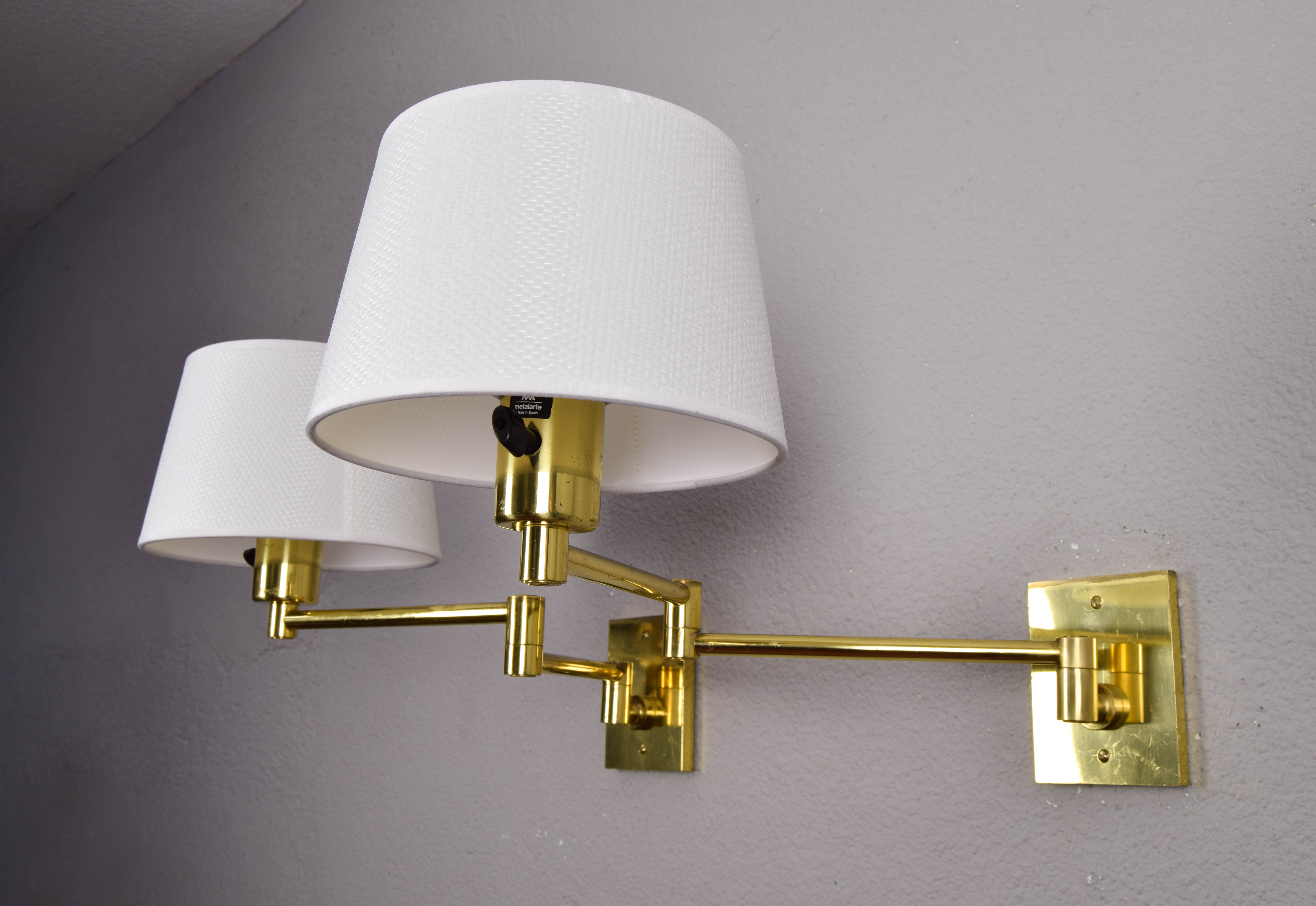 Two Mid-Century Modern Swing Arm Brass Sconces by George W Hansen for Metalarte