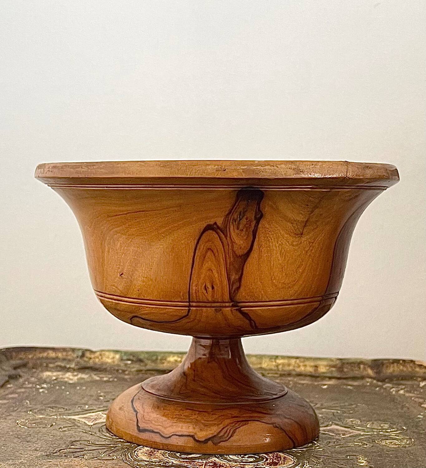 Empty pocket in olive wood