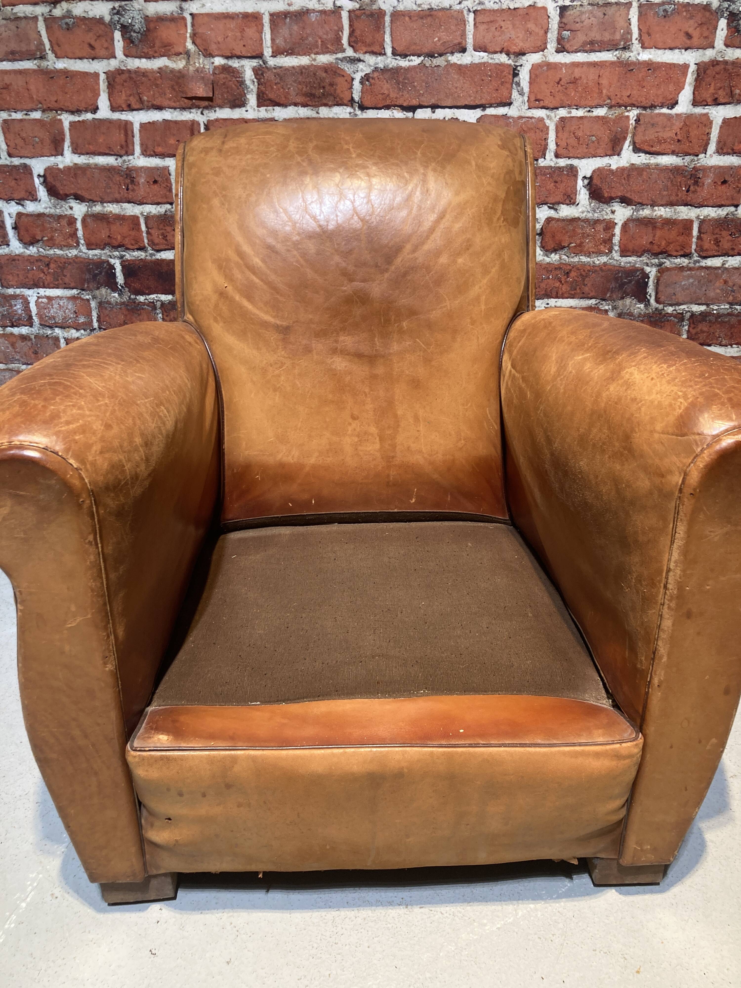 Brown leather armchair