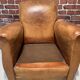 Brown leather armchair