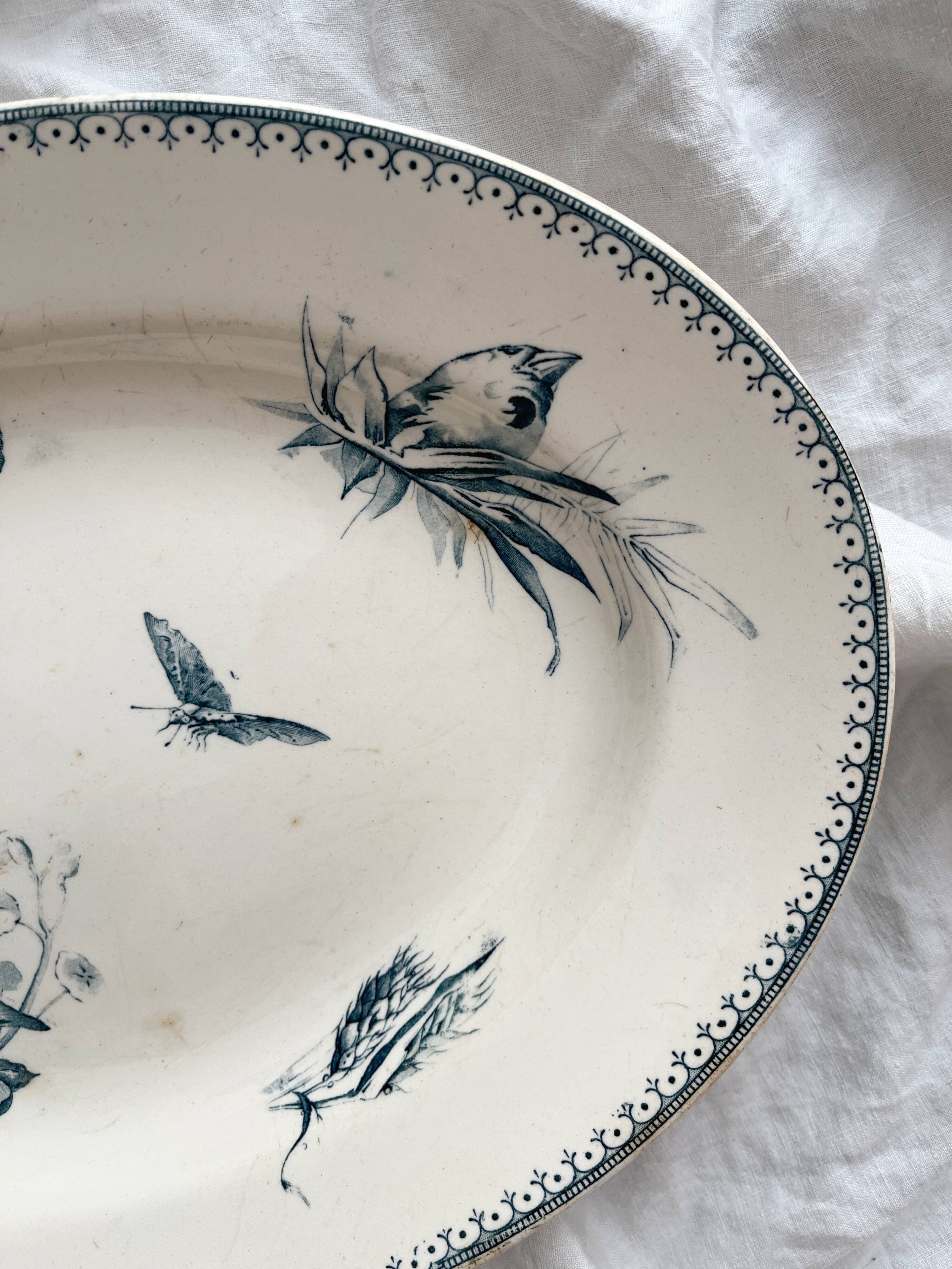 Oval ironstone dish with flowers and birds "Malaga" Petrus Regout